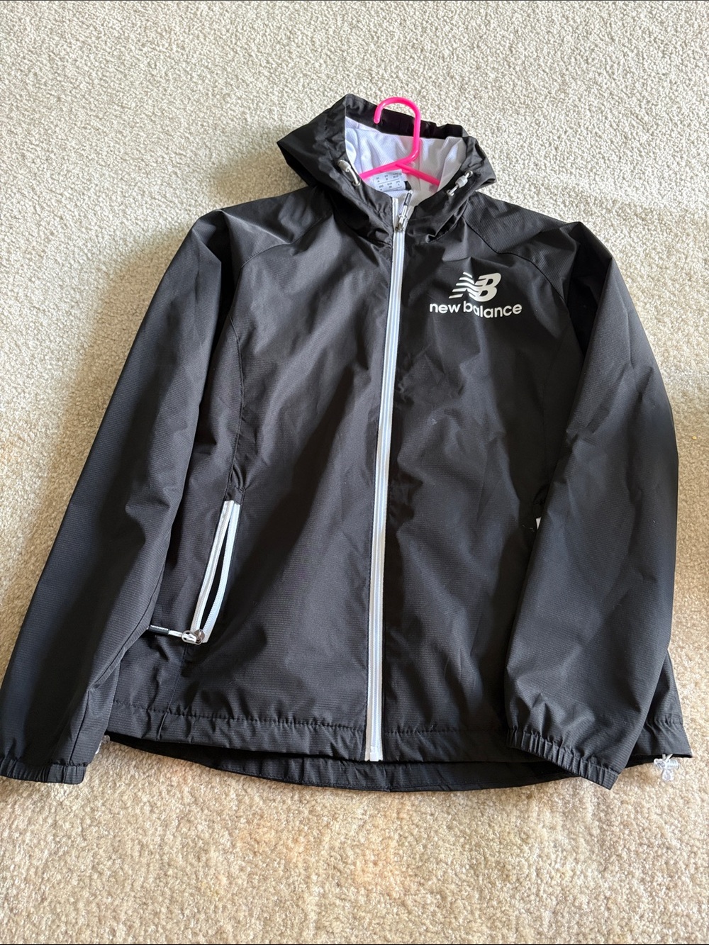 New Balance women’s  Black Hooded Rain Jacket with White Trim